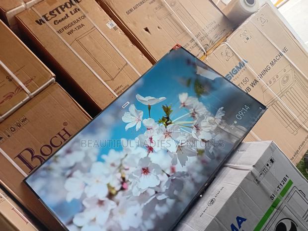 Advanced 55-Inch Uhd Smart Tv – A True Masterpiece TCL · Photo 1