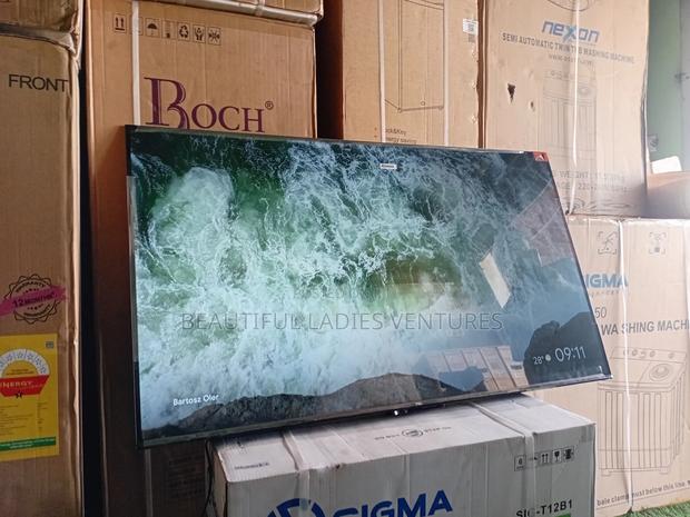 Massive 65-Inch Smart Ultra Hd Tv With Crystal Clear Picture TCL · Photo 1