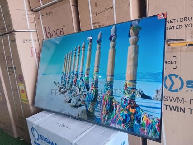 TCL 55” Smart Tv – Uhd Brilliance · Photo 1