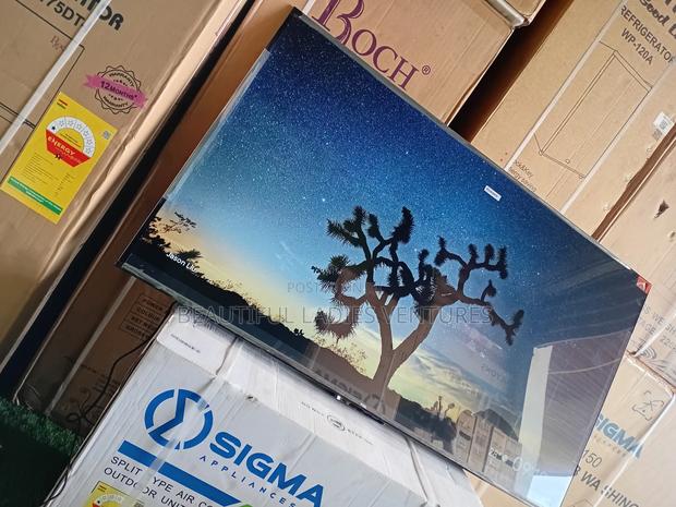 Modern 65-Inch Smart Television With Built-in Wi-Fi, Crystal TCL Tv · Photo 1