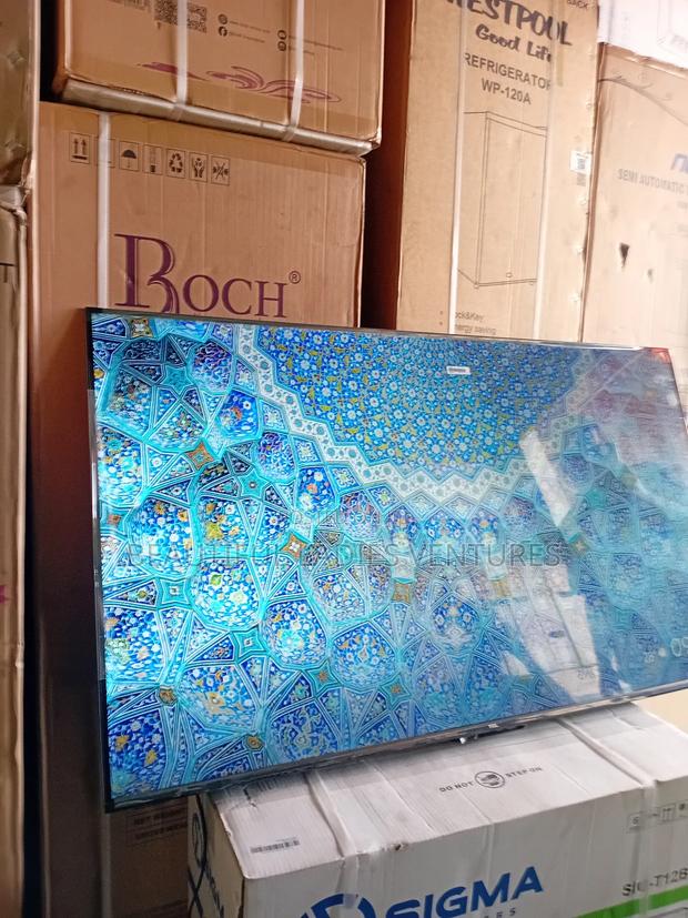 Bring Entertainment to Life With This 65-Inch Smart Led Tv Featuring · Photo 2