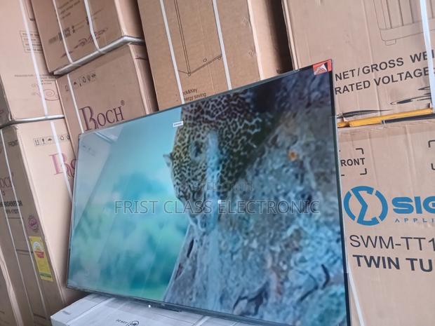 TCL 55” Ultra Hd Tv – See the Difference · Photo 2