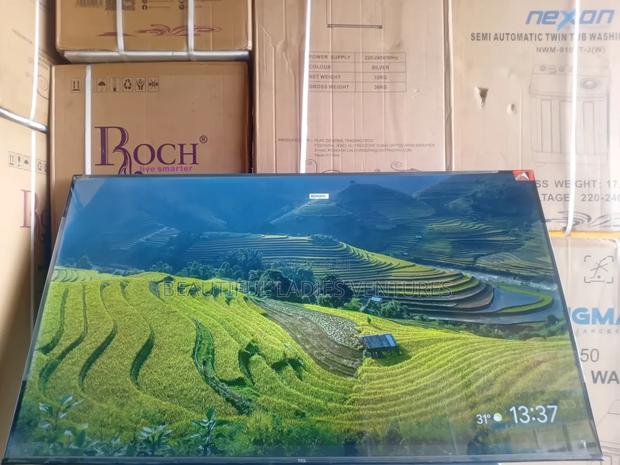 Stunning 55-Inch Smart Television With Crystal-Clear Built-in Wi-Fi · Photo 1