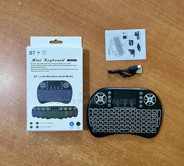 Mini Wireless Bluetooth Keyboard With Touchpad RGB Backlight · Photo 1