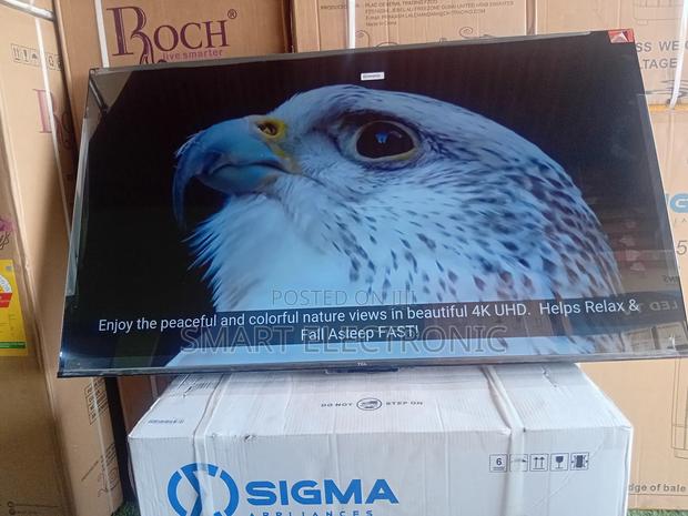 TCL 55inches Smart-Tv New in Box Uhd Flameless Design · Photo 1