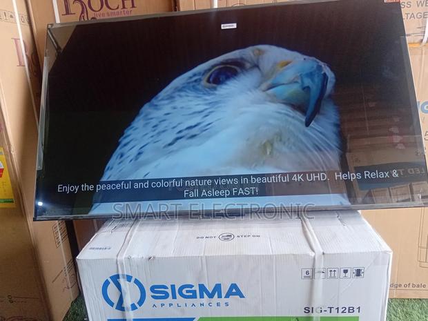 TCL 55inches Smart-Tv New in Box Uhd Flameless Design · Photo 2