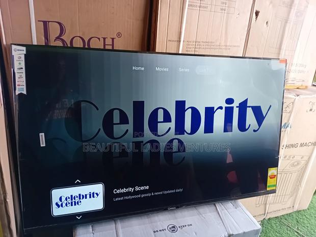Smart Tv With Super Sharp and Immersive Surround Sound Sigma Tv · Photo 1