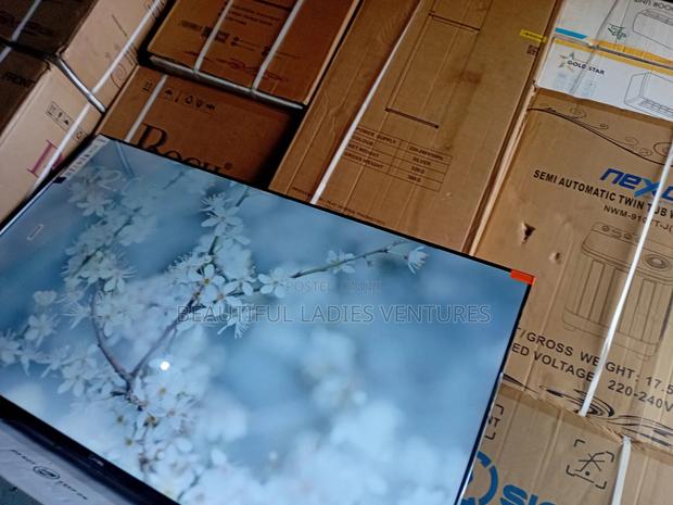 Sigma Television With Built-in Wi-Fi, Hdmi Ports, and Bluetooth Audio · Photo 1