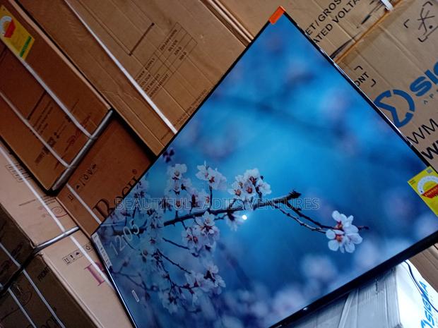 Big Screen 55-Inch Smart Television With Resolution for Realistic · Photo 1