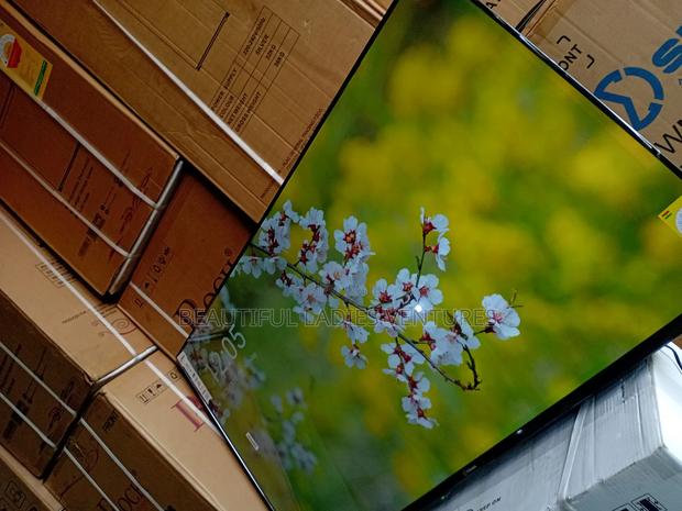 Big Screen 55-Inch Smart Television With Resolution for Realistic · Photo 2