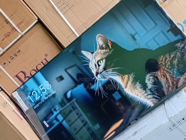 Elegant 55-Inch Android Smart Tv With Voice Control and Built-In · Photo 2