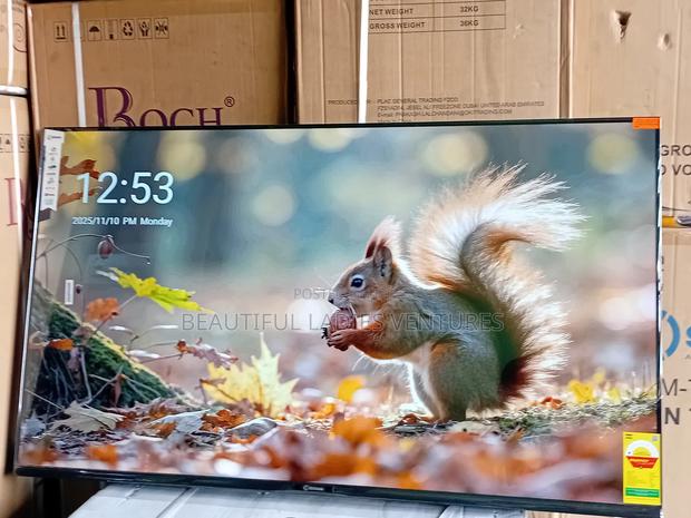 Breathtaking 55-Inch Smart Tv With Slim Frame and Powerful Tv · Photo 1