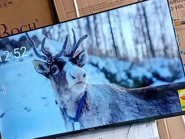 Full-Featured 55-Inch Smart Uhd Tv With Wi-Fi, Bluetooth, and Multiple · Photo 1
