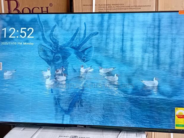Full-Featured 55-Inch Smart Uhd Tv With Wi-Fi, Bluetooth, and Multiple · Photo 2
