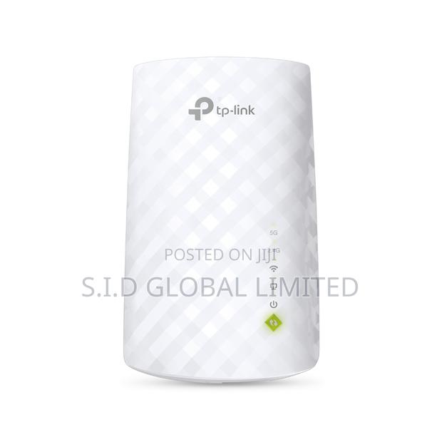 Tp-link Ac750 Creates A Mesh Network By Connecting To A Tp-link · Photo 1