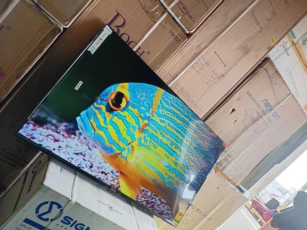 Crystal-Clear 55-Inch Smart Led Tv With Rich Colors and Smart Tv · Photo 2