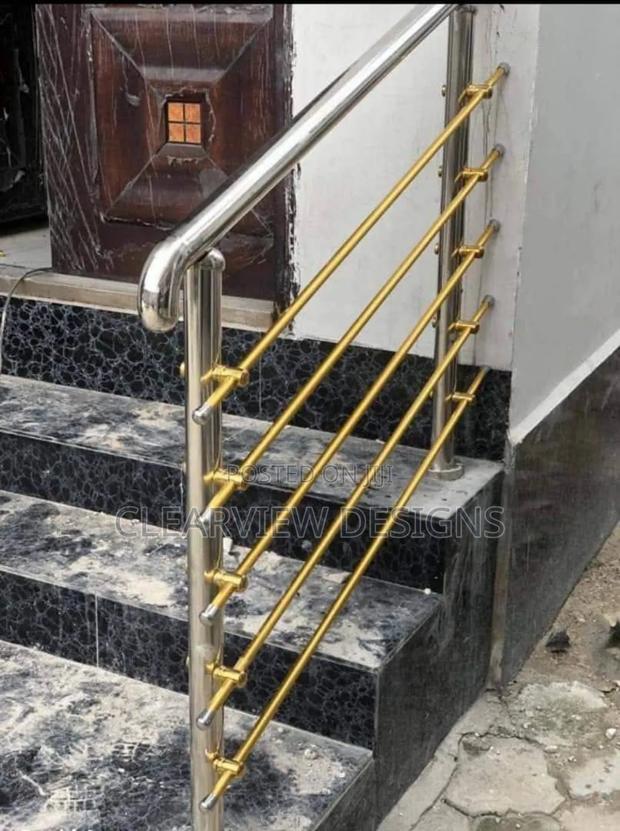 Gold and Silver Stainless Steel Handrail Fabrication · Photo 1