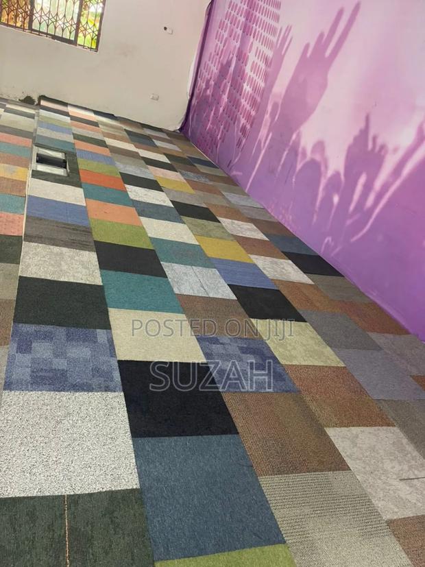 Multi- Colored Carpet Tiles · Photo 1