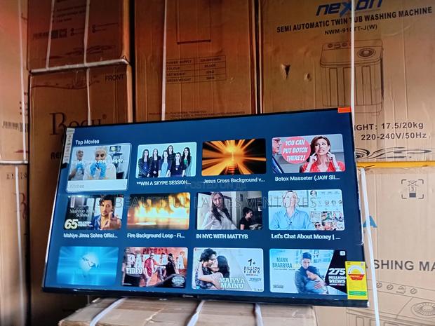 Smart Innovation 55-Inch Tv High-Speed Wi-Fi and Great Color Depth · Photo 1