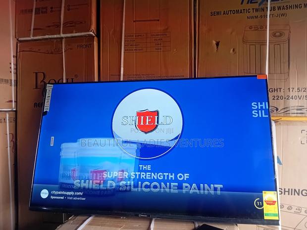 Smart Television With Elegant Design and Rich Multimedia Features Tv · Photo 1