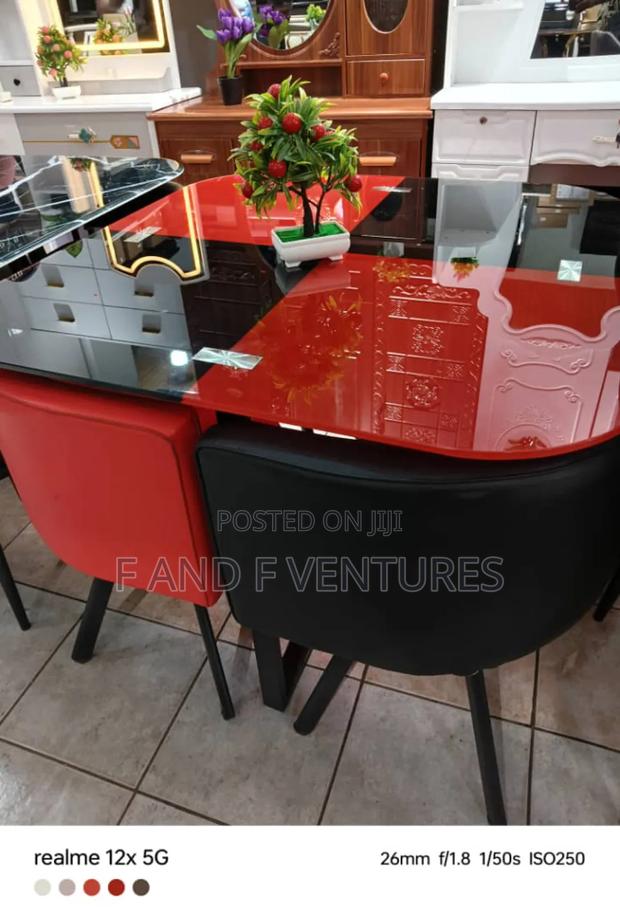 Glass Top Table and Chairs · Photo 1