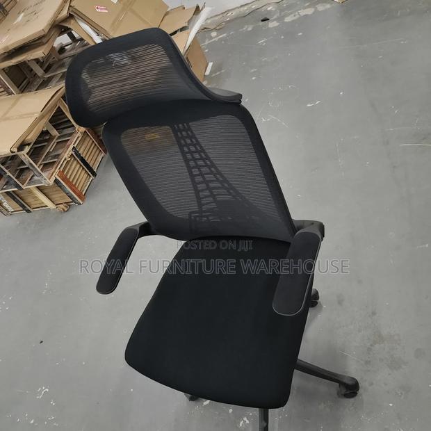 Black Swivel Office Chair With Flip Up Arms · Photo 1