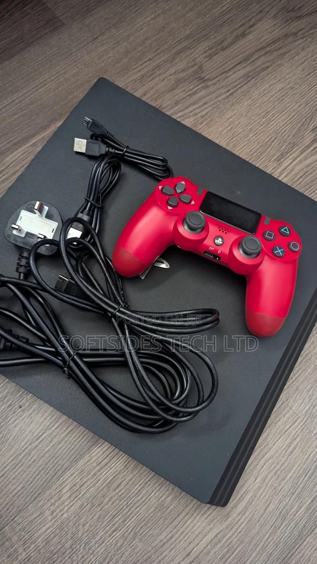 Playstation 4 Pro With Two(2) Controllers And 17 Games Promo!! · Photo 3