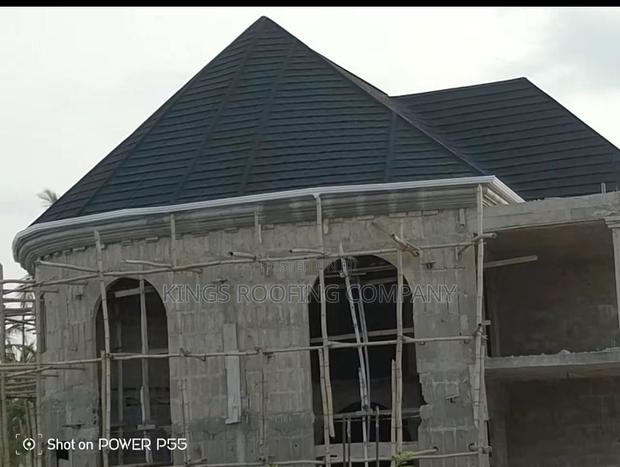 Desired Shingle Euro Tiles Project by Kings Roofing Company LTD · Photo 1