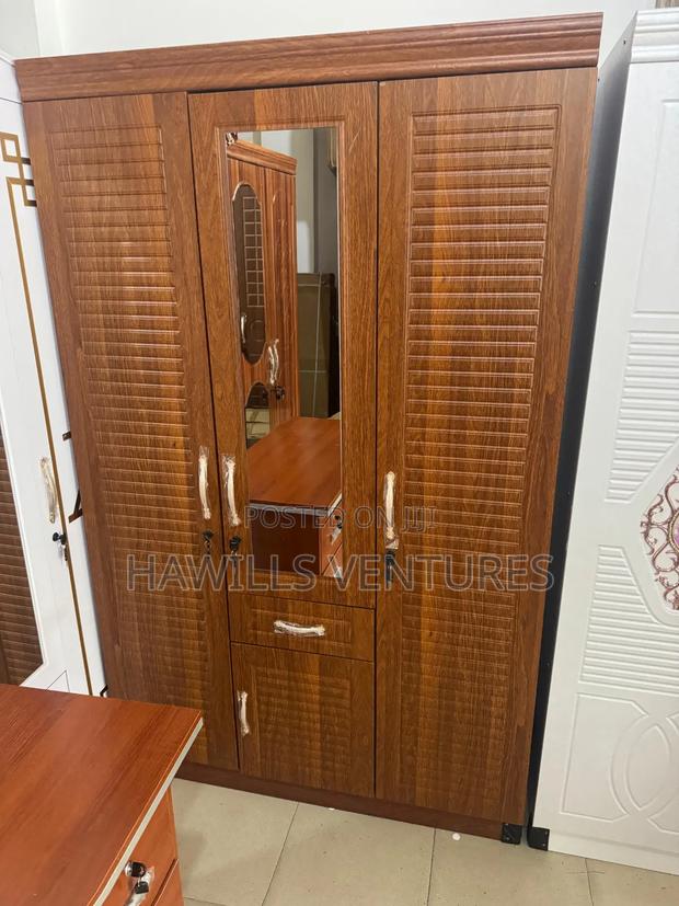 Three in One Wooden Brown Wardrobe · Photo 1