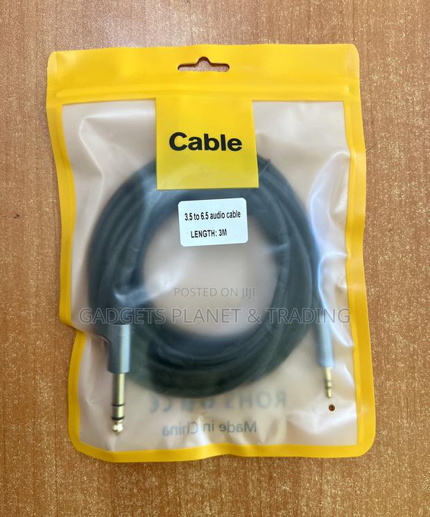 3.5mm to 6.5mm Male to Male Audio Adapter Cable - 3m · Photo 1