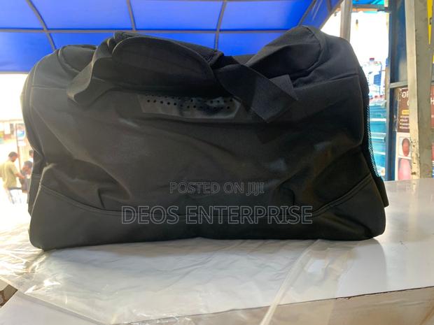 Duffel Waterproof Fitness Backpack Traveling Bag for Men Women · Photo 1