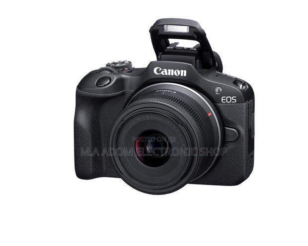 Canon Eos R100 With 18-55 Mm Lens · Photo 1