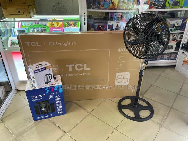TCL 65 Inches Google Tv With Fan,Kettle and Home Theatre · Photo 1