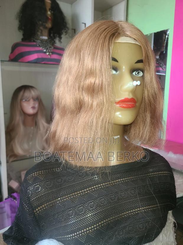 Blonde Wavy Human Hair Wig · Photo 1