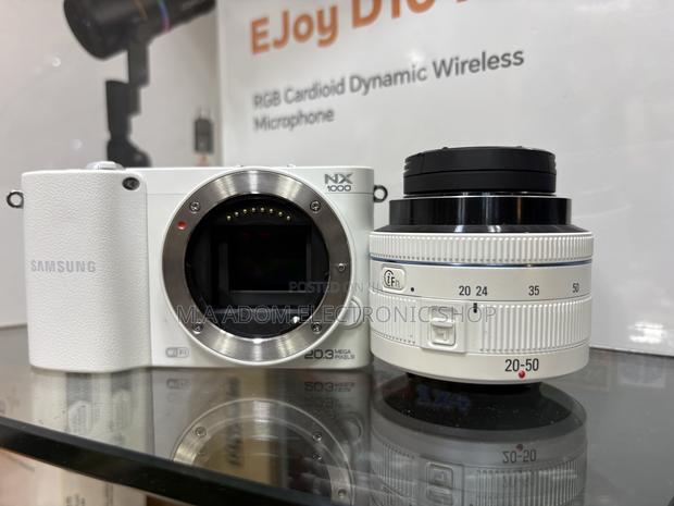Used Samsung Nx100 Interchangeable Lens Camera · Photo 1