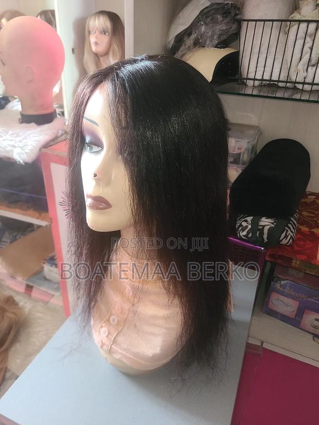 Black Wavy Human Hair Wig · Photo 1