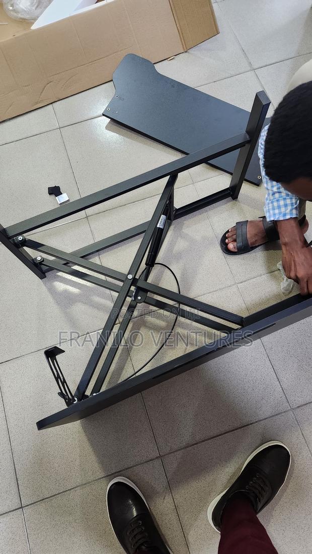 Adjustable Sit- Stand Desk Converter · Photo 2