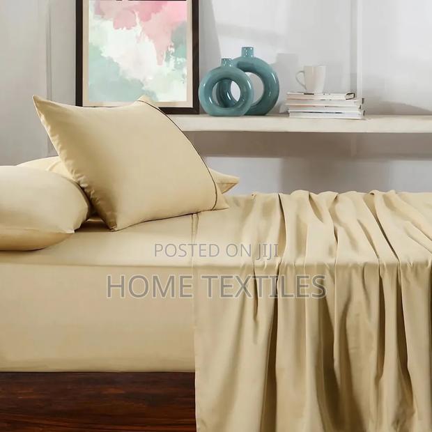 1 Fitted Beige Bedsheet ,1 Flat Beige Bedsheet and 4 Pillowcases · Photo 1