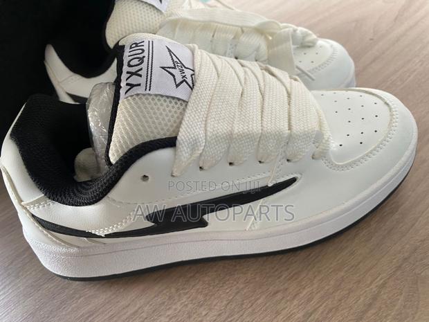 White Sneaker · Photo 1