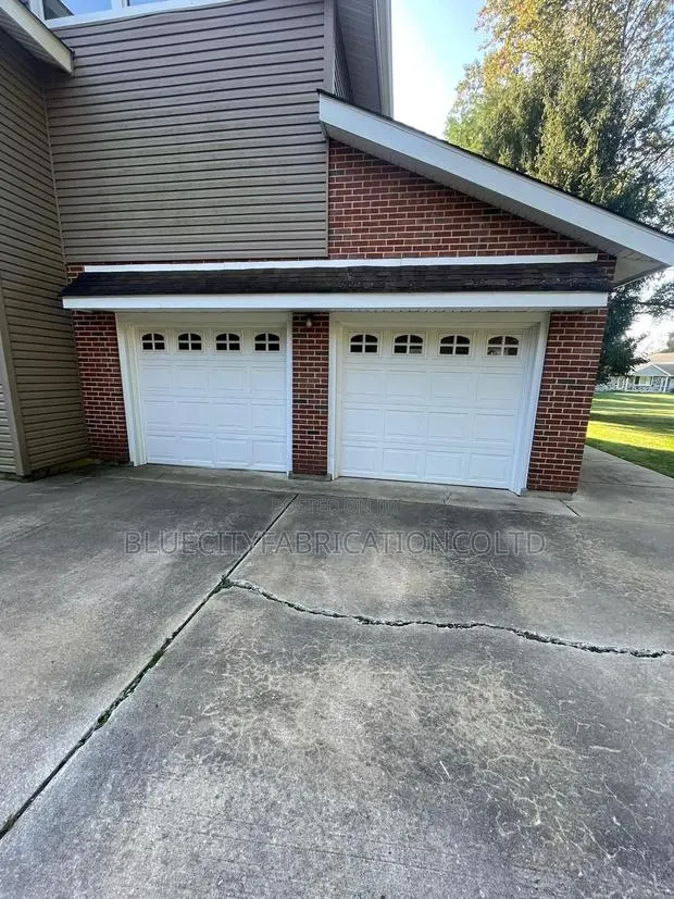 Garage Door With Small Windows Available Now for Sale · Photo 1
