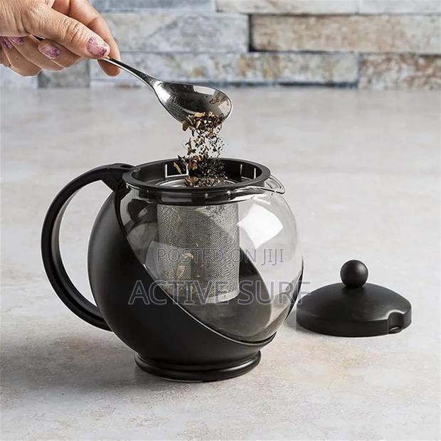 Half-moon Tea Pot With Herb Infuser – Where Style Meets Serenity · Photo 1