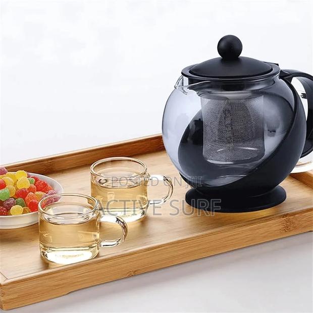 Half-moon Tea Pot With Herb Infuser – Where Style Meets Serenity · Photo 4
