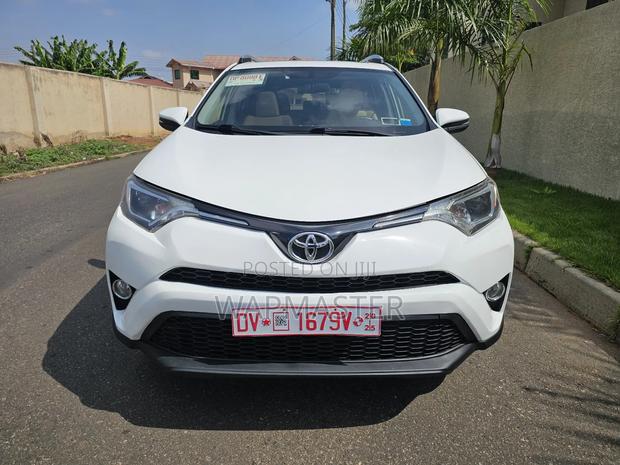 Toyota RAV4 XLE AWD (2.5L 4cyl 6A) 2016 White · Photo 3