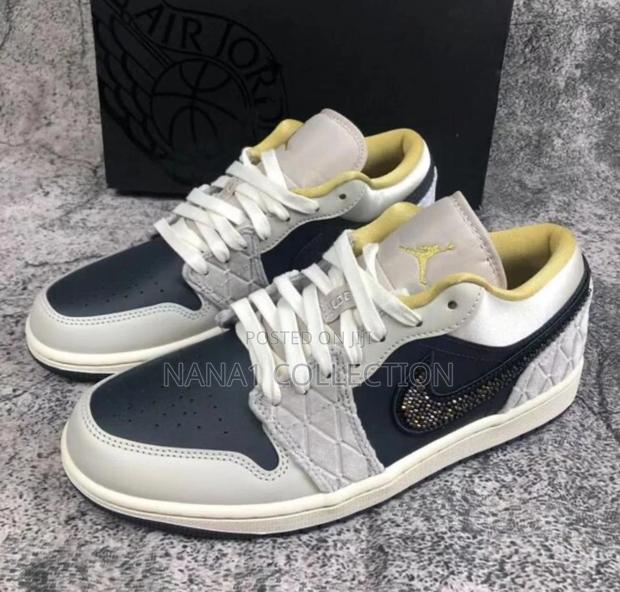Air Jordan 1 Low “Beeded Swoosh” Sneakers · Photo 1