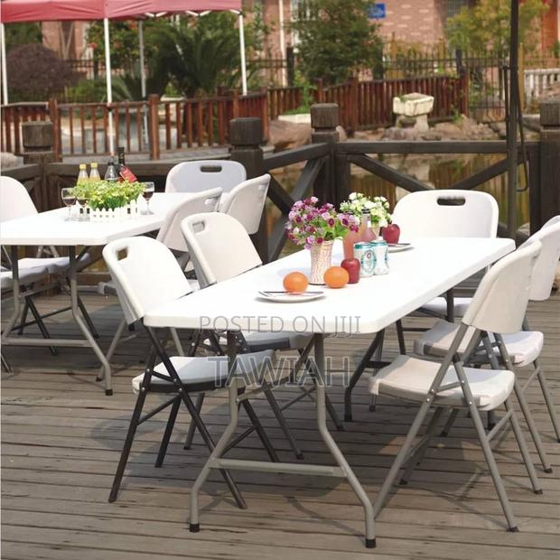 Folderble Table and 4 Chairs · Photo 1