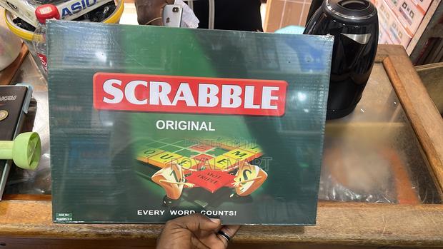 Scrabble, Monopoly, Uno and Jenga Game · Photo 1