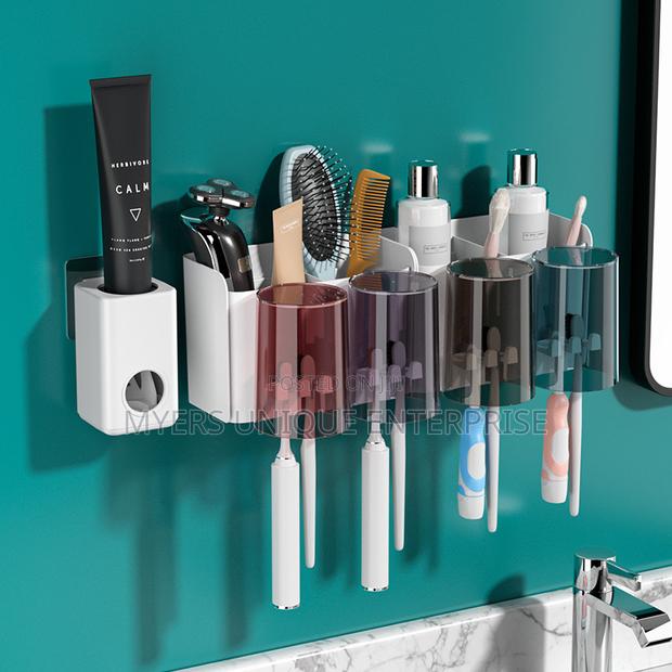 Quality Toothpaste Dispenser Toothbrush Holder Organizer With Cups · Photo 1