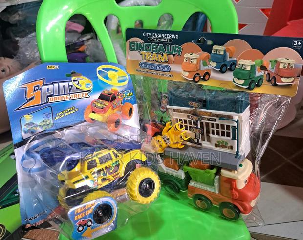 Kids Car Spin Car and Dinosaur Team Truck 1 Years to 4 Years · Photo 1