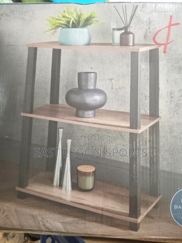Coberg.3 Tier Shelf Black Plastic Frame With Rustic Dark Wood Finish · Photo 1