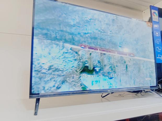 **Tcl 32" Android TV – Stream, Browse, Enjoy**
 L · Photo 2